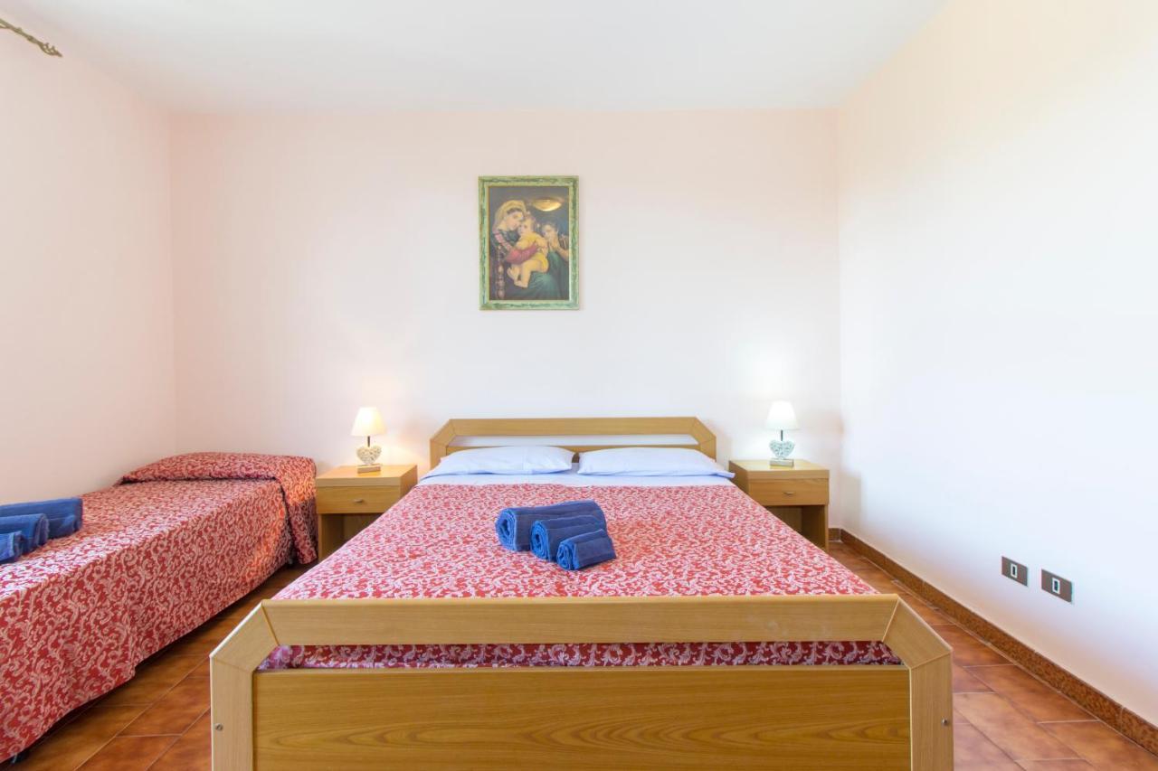 Appartamenti In Villa Con Ampio Giardino Esterno โปซาดา ภายนอก รูปภาพ