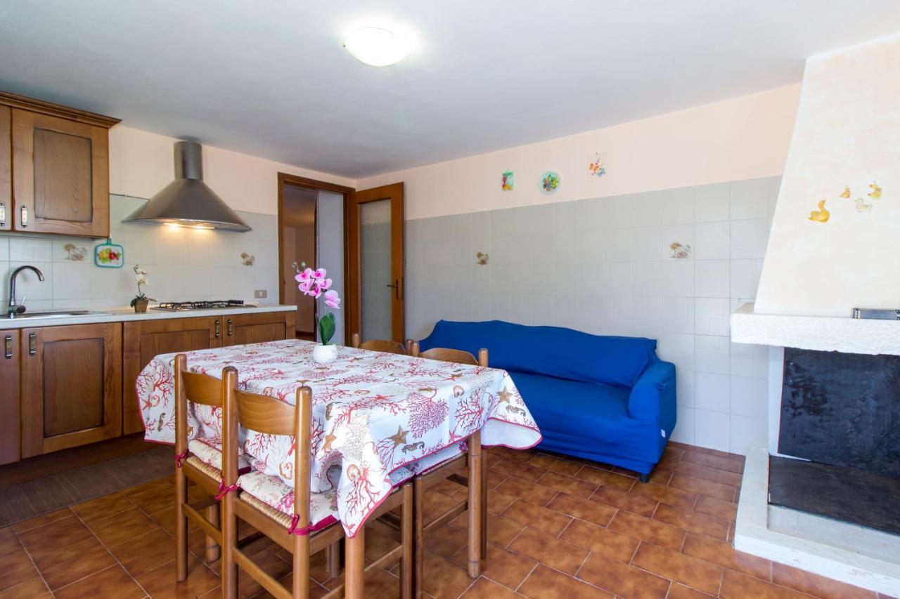 Appartamenti In Villa Con Ampio Giardino Esterno โปซาดา ภายนอก รูปภาพ