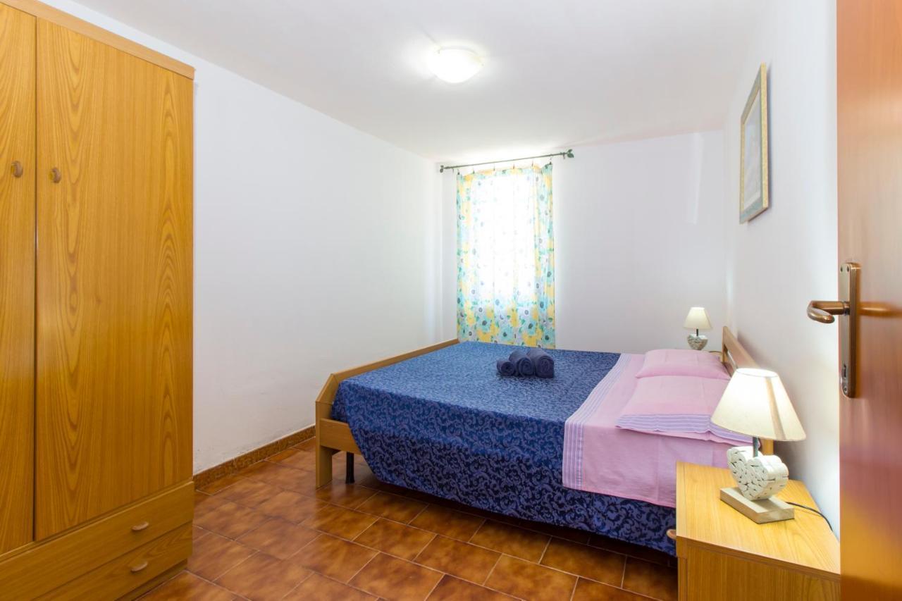 Appartamenti In Villa Con Ampio Giardino Esterno โปซาดา ภายนอก รูปภาพ