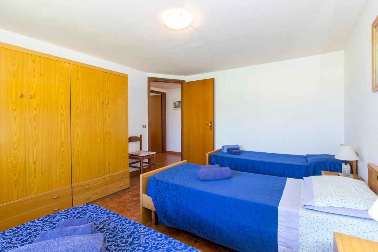 Appartamenti In Villa Con Ampio Giardino Esterno โปซาดา ภายนอก รูปภาพ